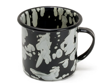 Taza de mesa de peltre negro con manchas blancas y borde negro